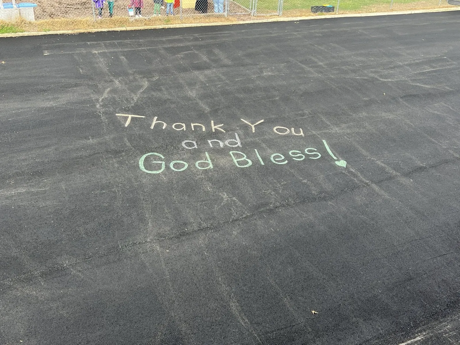 "Thank You and God Bless" written in chalk on fresh asphalt, TESTIMONIAL VISUAL GOLD, All County Paving NJ and PA