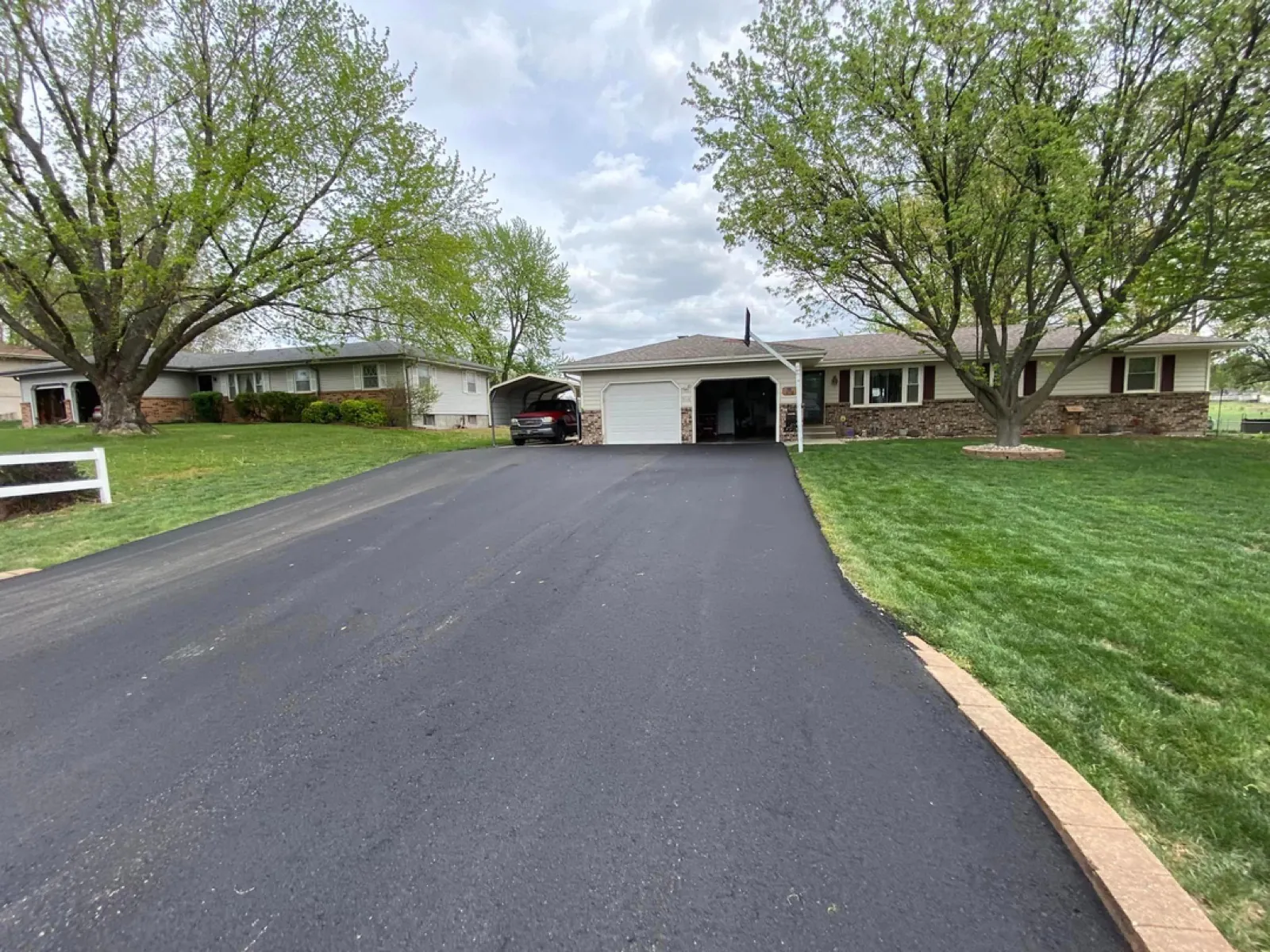 Asphalt driveway paved by All County Paving