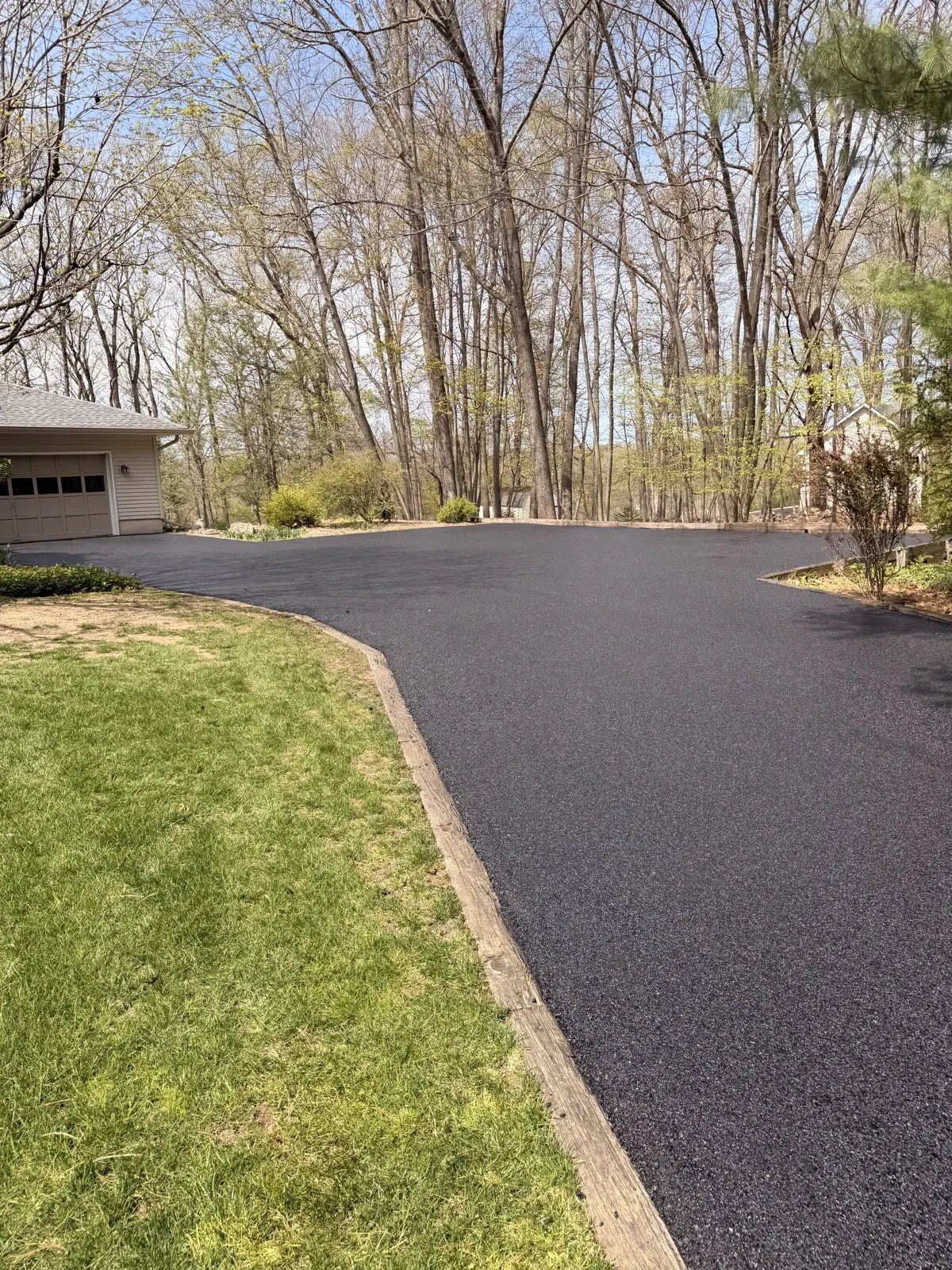 Finished driveway with home, All County Paving NJ and PA