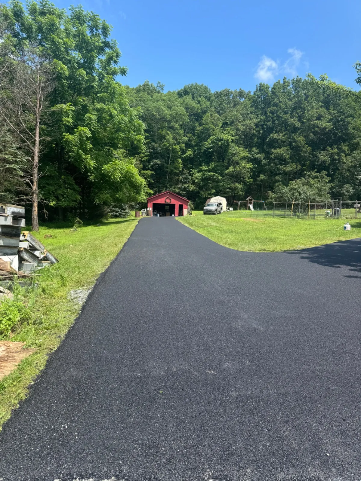 Long shaded driveway with shadow patterns, All County Paving NJ and PA