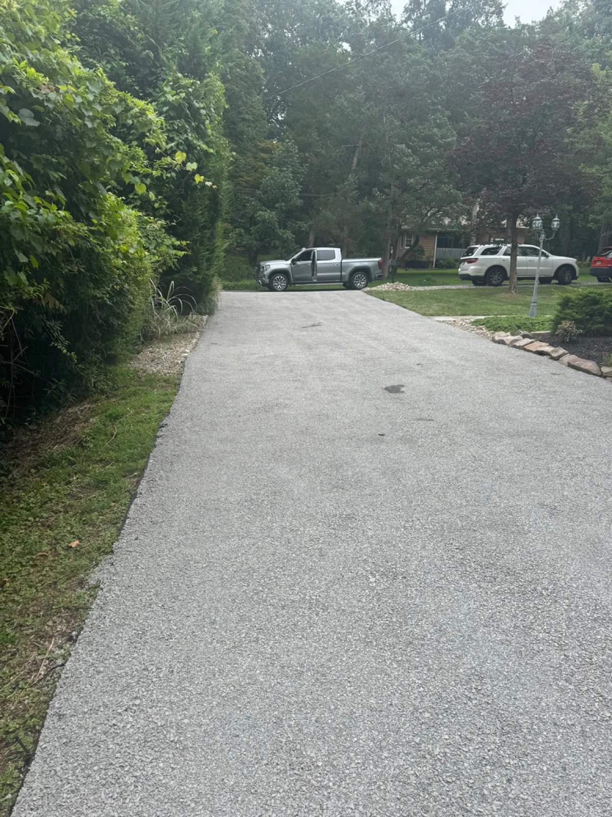 Driveway with mature trees both sides, All County Paving NJ and PA