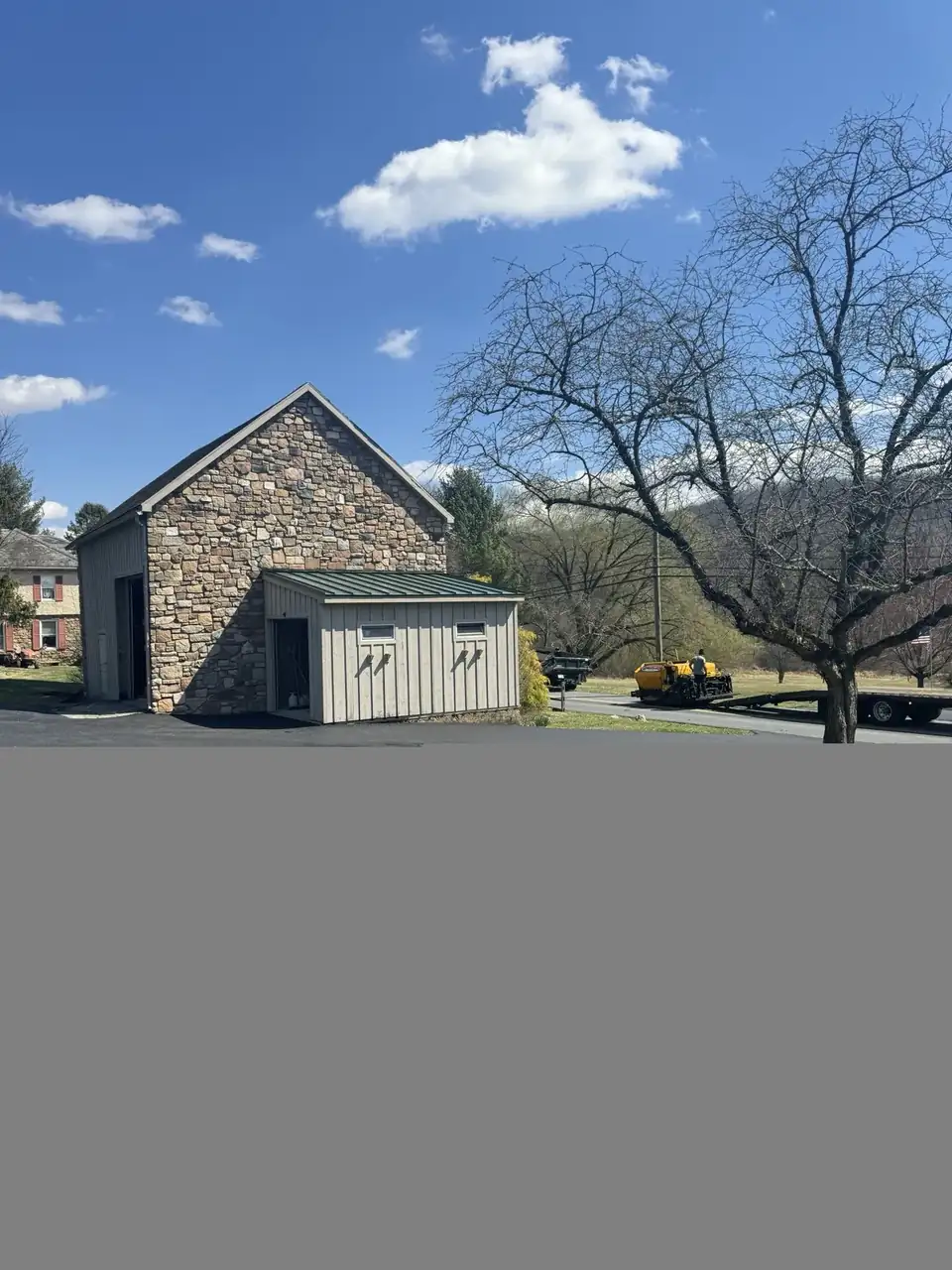 Stone-clad estate building, fresh paving, paved by All County Paving in New Jersey