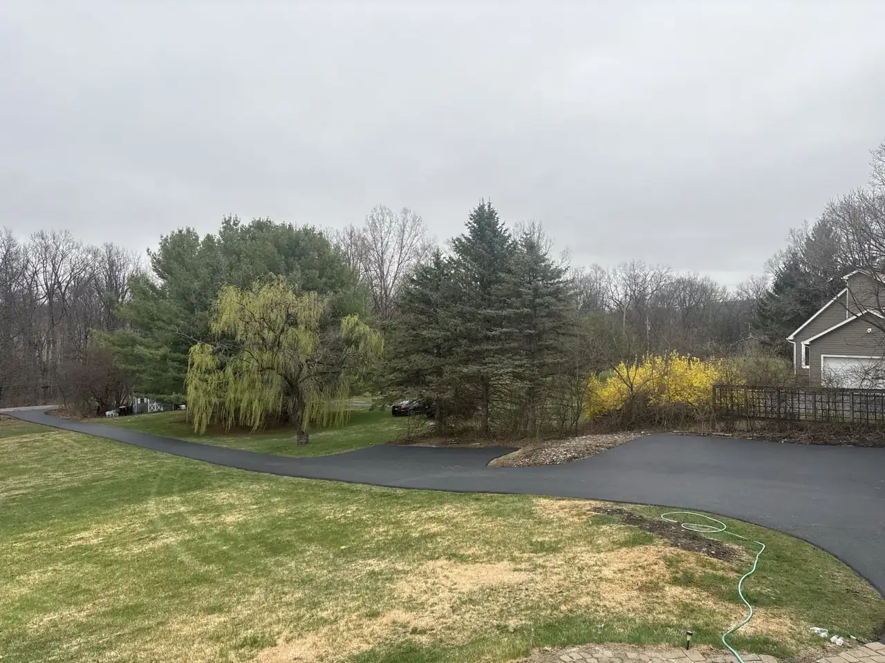 Open suburban property driveway, paved by All County Paving in New Jersey