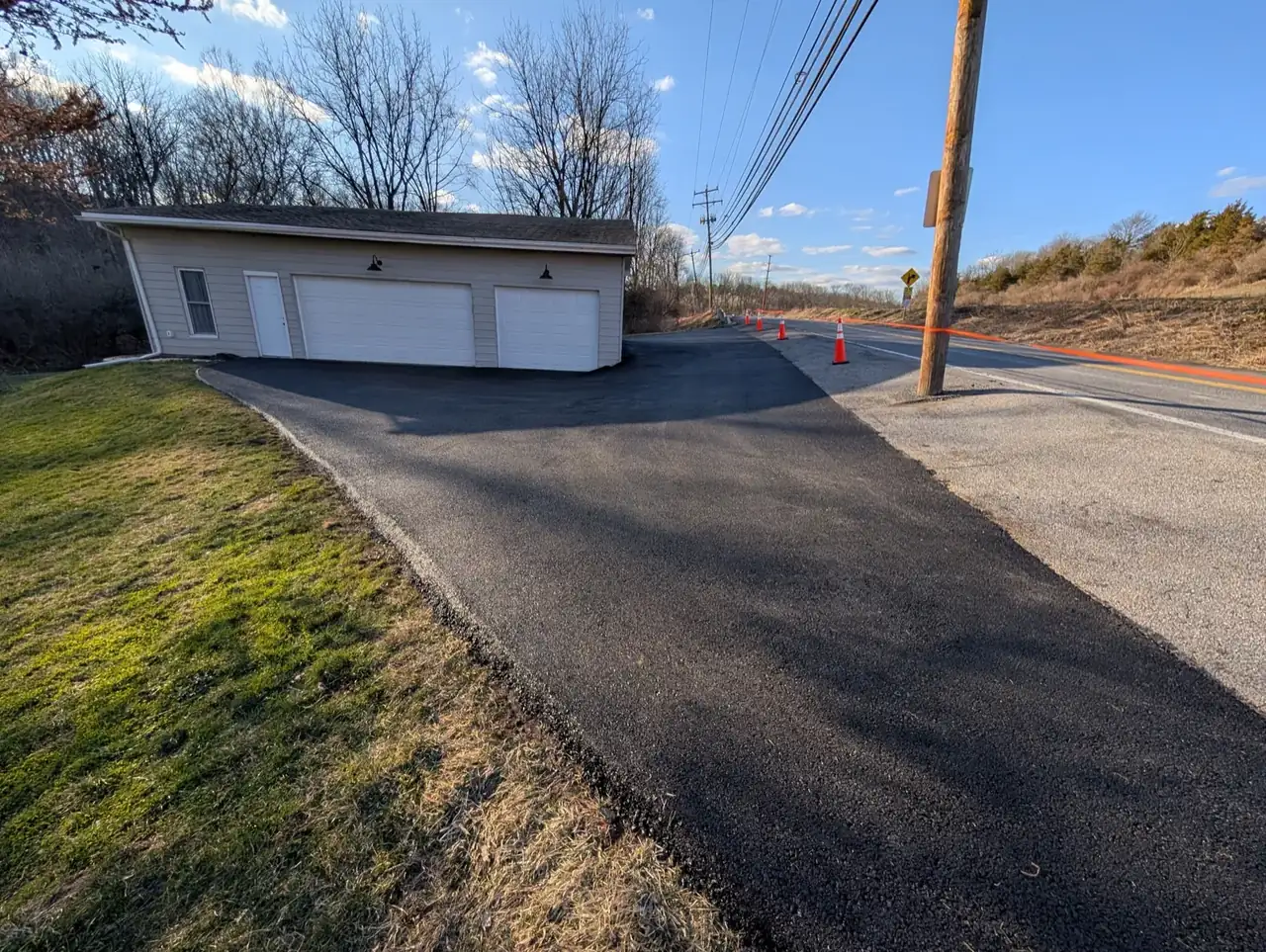Clean wide driveway approach, paved by All County Paving in New Jersey