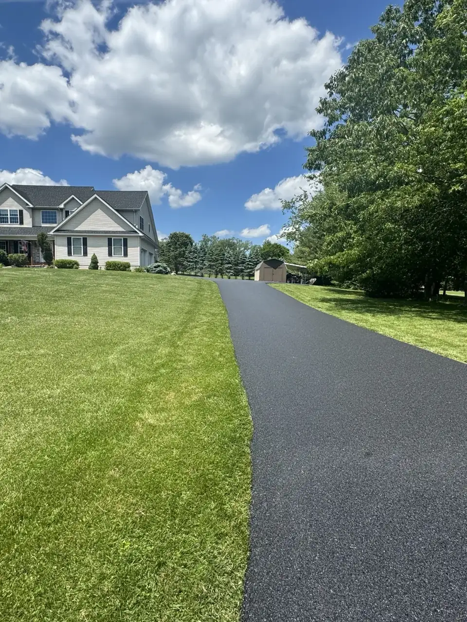 Driveway to multi-story home, paved by All County Paving in New Jersey