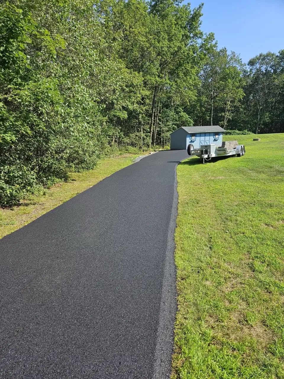 Long driveway with home in distance, paved by All County Paving in New Jersey